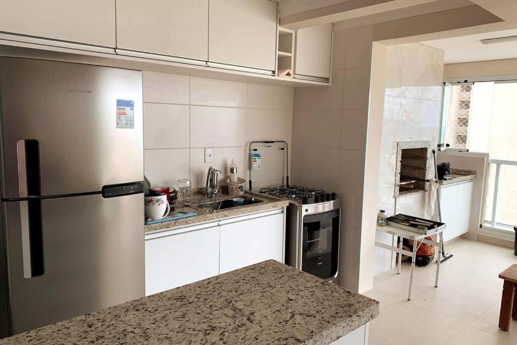 גוארויה Condominio Club, Vista Para O Mar, Churrasqueira מראה חיצוני תמונה